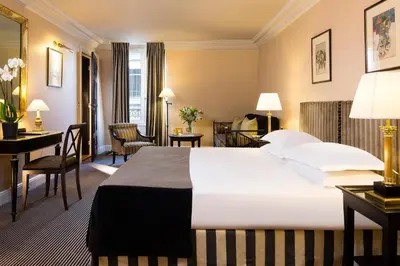 Un ou plusieurs lits dans un hébergement de l'établissement Hotel La Villa d'Estrées - Saint-Germain