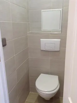 Salle de bains dans l'établissement Hôtel Richard