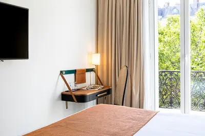 Télévision ou salle de divertissement dans l'établissement Hotel Le Friedland