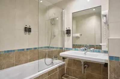 Salle de bains dans l'établissement Hotel Etoile Saint Ferdinand by Happyculture