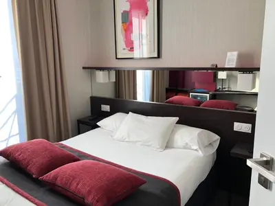 Un ou plusieurs lits dans un hébergement de l'établissement Hôtel Charing Cross