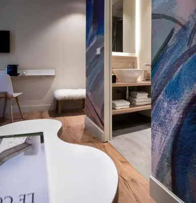 Un ou plusieurs lits dans un hébergement de l'établissement Hotel Max