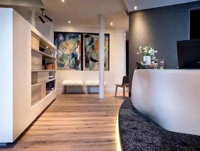 Télévision ou salle de divertissement dans l'établissement Hotel Max