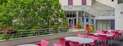 Restaurant ou autre lieu de restauration dans l'établissement Hotel CIS Paris Kellermann