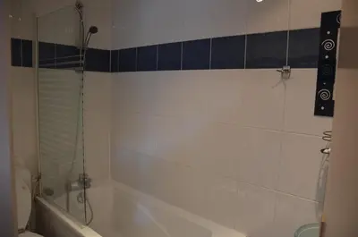 Salle de bains dans l'établissement Grand Hotel Nouvel Opera