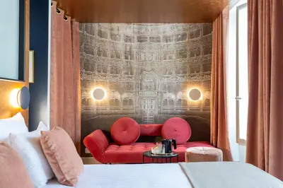 Un ou plusieurs lits dans un hébergement de l'établissement Hotel Sacha