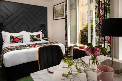 Un ou plusieurs lits dans un hébergement de l'établissement Hôtel des Arts Montmartre
