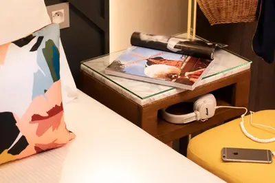 Un ou plusieurs lits dans un hébergement de l'établissement Hôtel des Arts Montmartre