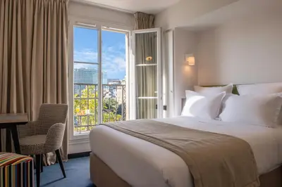 Un ou plusieurs lits dans un hébergement de l'établissement Hôtel Edouard 6 by Malone