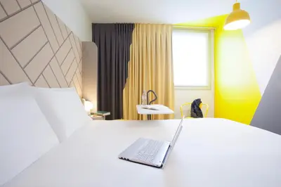 Un ou plusieurs lits dans un hébergement de l'établissement Ibis Styles Paris Massena Olympiades