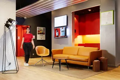 Coin salon dans l'établissement Ibis Styles Paris Massena Olympiades
