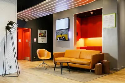 Coin salon dans l'établissement Ibis Styles Paris Massena Olympiades