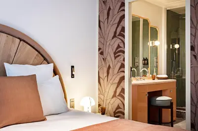 Un ou plusieurs lits dans un hébergement de l'établissement Hotel Florida Paris