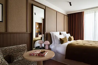 Un ou plusieurs lits dans un hébergement de l'établissement Hotel Florida Paris