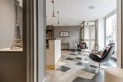 Cuisine ou kitchenette dans l'établissement Eiffel Kennedy