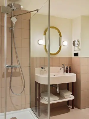 Salle de bains dans l'établissement Hôtel Mercedes