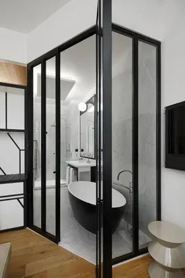 Salle de bains dans l'établissement Hôtel du Ministère