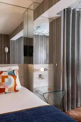 Un ou plusieurs lits dans un hébergement de l'établissement Le 7 Eiffel Hotel by Malone