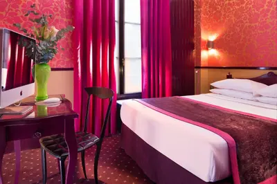 Un ou plusieurs lits dans un hébergement de l'établissement Hotel Design Sorbonne