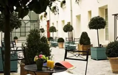 Jardin de l'établissement Hotel Suites Unic Renoir Saint-Germain