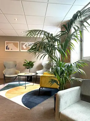 Coin salon dans l'établissement Timhotel Opera Madeleine