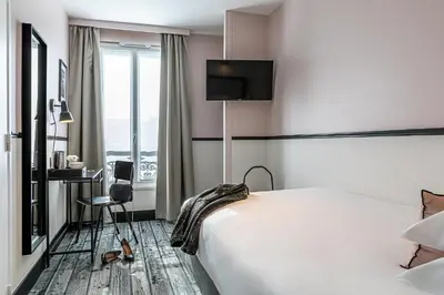 Un ou plusieurs lits dans un hébergement de l'établissement Hotel de l'Aqueduc