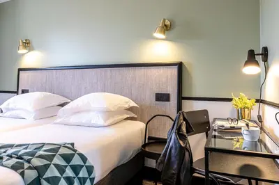 Un ou plusieurs lits dans un hébergement de l'établissement Hotel de l'Aqueduc