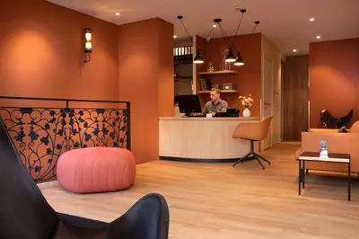 Coin salon dans l'établissement Hôtel du Jardin des Plantes