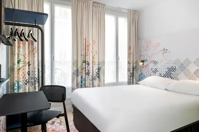 Un ou plusieurs lits dans un hébergement de l'établissement Ibis Styles Paris Gare Saint Lazare