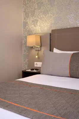 Un ou plusieurs lits dans un hébergement de l'établissement Timhotel Tour Eiffel