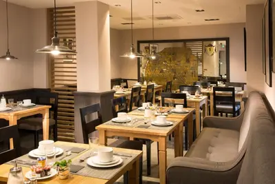 Coin salon dans l'établissement Hôtel Albert 1er Paris Lafayette