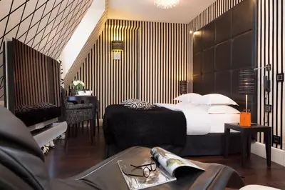 Un ou plusieurs lits dans un hébergement de l'établissement Hotel Ares Eiffel