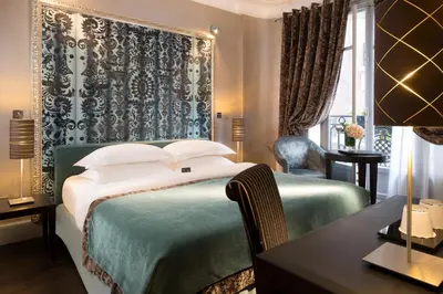 Un ou plusieurs lits dans un hébergement de l'établissement Hotel Ares Eiffel