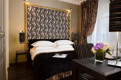 Un ou plusieurs lits dans un hébergement de l'établissement Hotel Ares Eiffel