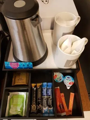 Cuisine ou kitchenette dans l'établissement Hôtel Harvey
