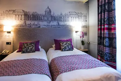 Un ou plusieurs lits dans un hébergement de l'établissement Hôtel Harvey