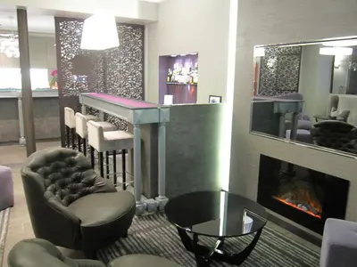 Coin salon dans l'établissement Hôtel Harvey