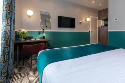Un ou plusieurs lits dans un hébergement de l'établissement Hotel Elysa-Luxembourg