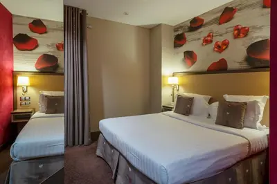 Un ou plusieurs lits dans un hébergement de l'établissement Hotel Elysa-Luxembourg