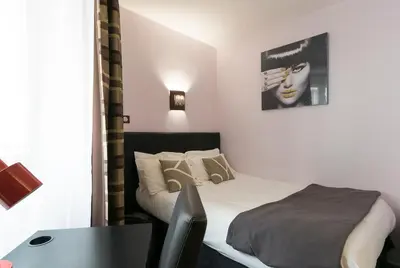 Un ou plusieurs lits dans un hébergement de l'établissement Prince Monceau