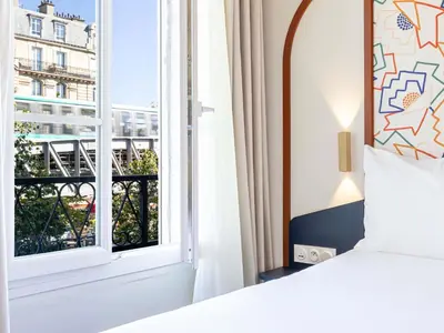 Un ou plusieurs lits dans un hébergement de l'établissement ibis Styles Paris Eiffel Cambronne