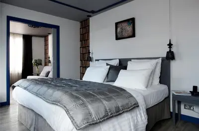 Un ou plusieurs lits dans un hébergement de l'établissement Hotel Mademoiselle
