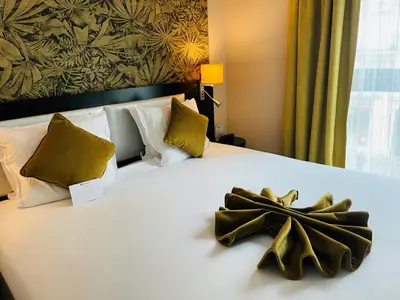Un ou plusieurs lits dans un hébergement de l'établissement Best Western Allegro Nation