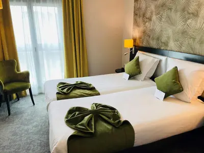Un ou plusieurs lits dans un hébergement de l'établissement Best Western Allegro Nation