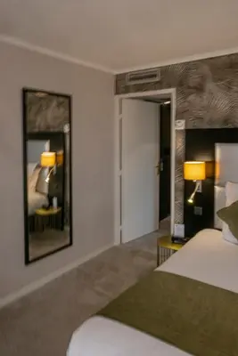 Un ou plusieurs lits dans un hébergement de l'établissement Best Western Allegro Nation