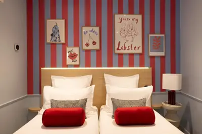 Un ou plusieurs lits dans un hébergement de l'établissement Hotel La Folie des Pres - Saint-Germain-des-Pres
