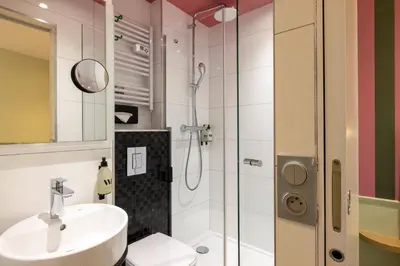 Salle de bains dans l'établissement Hotel La Folie des Pres - Saint-Germain-des-Pres