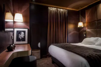 Un ou plusieurs lits dans un hébergement de l'établissement Hotel Armoni Paris