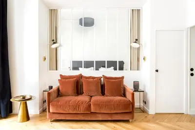 Coin salon dans l'établissement Habitat Parisien - 1BR-1BA - Louvre