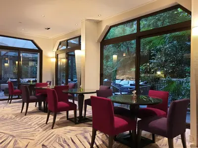 Coin salon dans l'établissement Garden-Elysée